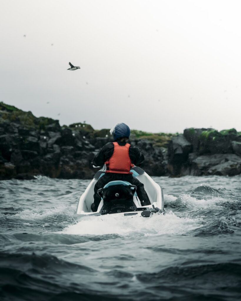 exploring puffins in iceland on jet ski